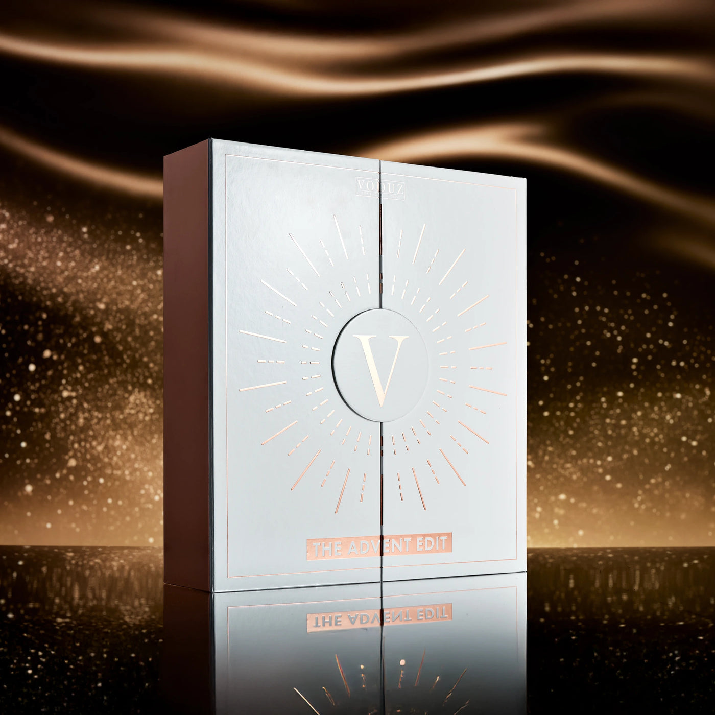 Voduz 2025 advent calendar packaging with rose gold accents on a white background