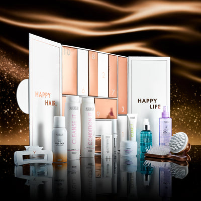Voduz 2025 advent calendar packaging opened showing the 12 days of christmas with rose gold accents on a white background