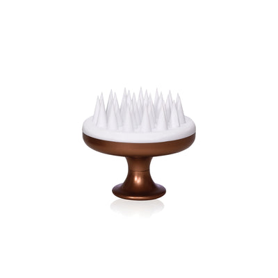 Voduz scalp hair brush with white bristles on a bronze coloured base against a white background