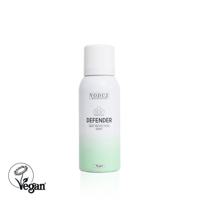 A can of Voduz Defender Heat Protection Spray 75ml, primarily in white and green color, with text and branding with Vegan Society Logo.