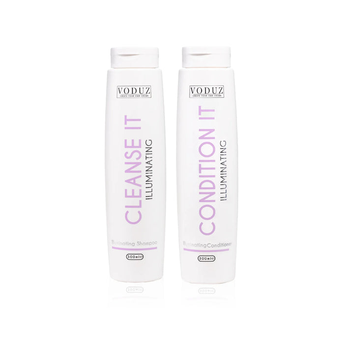 Two Voduz hair care bottles, one for cleanse and one for condition, on a white background.