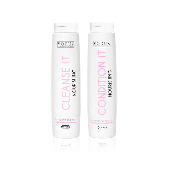 Two Voduz shampoo and conditioner bottles on a white background
