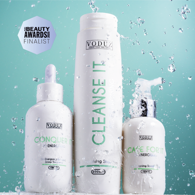 Voduz skincare products with 'Cleanse It' and 'Conquer It' on a teal background with a 'PURE UK BEAUTY AWARDS 2025 FINALIST' Sticker