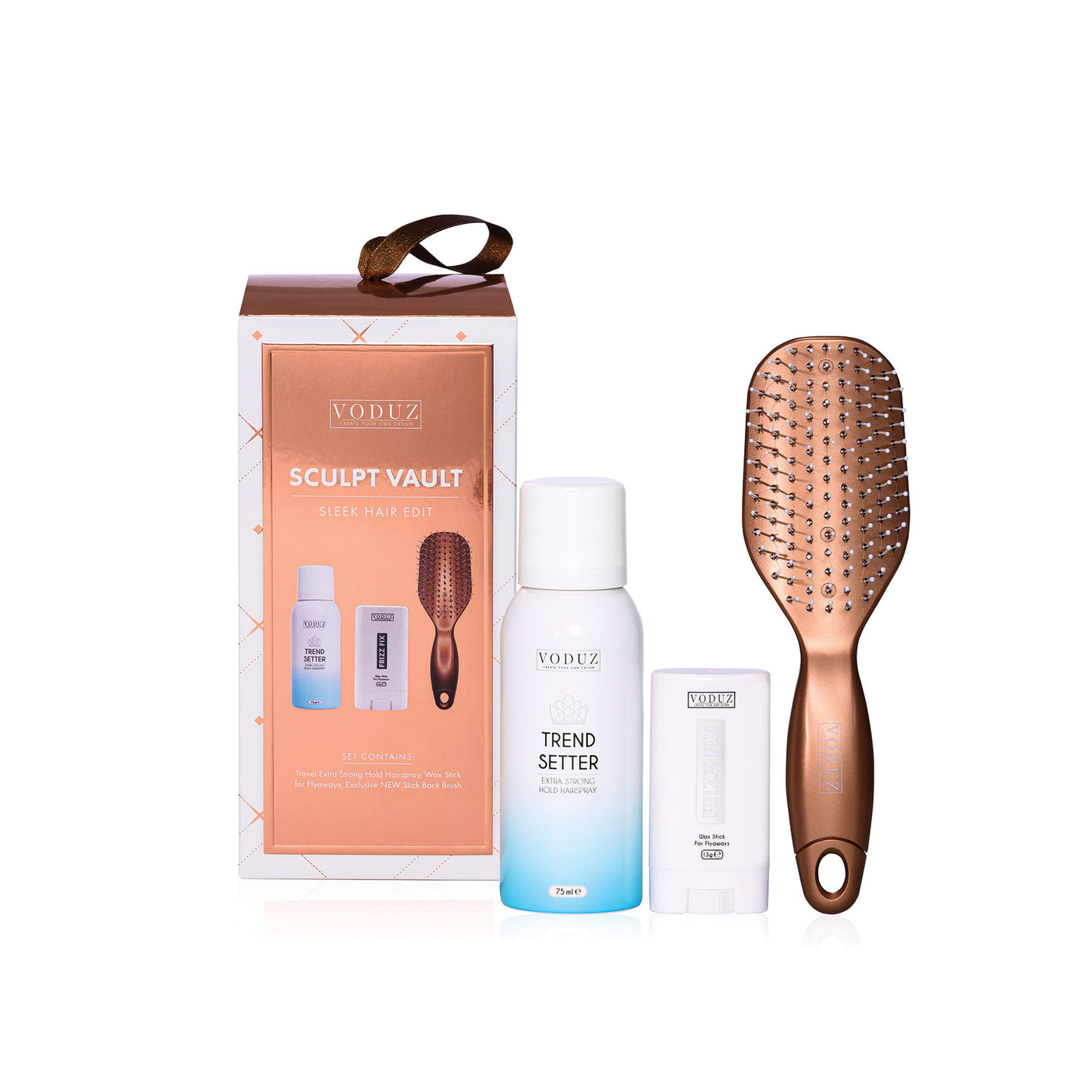 Voduz hair care set with a box, bottle, and brush on a white background